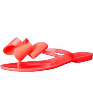 Melissa’s Red flip flops